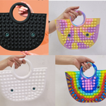 Pop it håndtasker i 4 forskellige varianter ( farver)